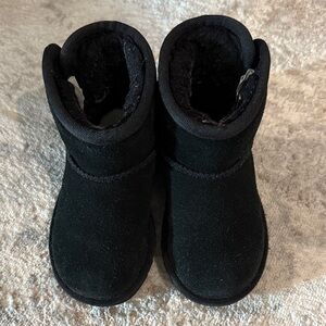 Toddler size 8 UGG boot in black